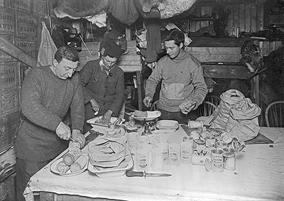 Bowers, Atkinson, Cherry-Garrard, cutting up pemmican, 23rd June 1911