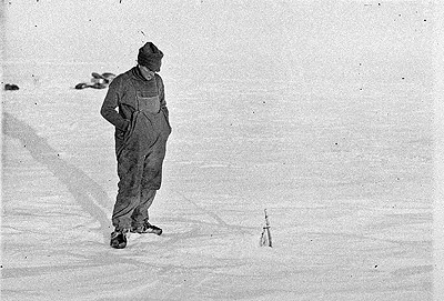 Hodgeman gazing tip depot flag protruding snow to Mt Murchison