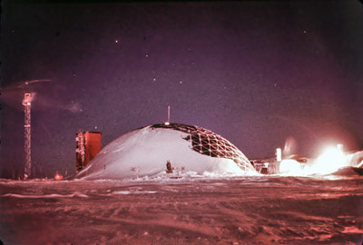 The picture is a time lapse photo taken of the South Pole Station during the 1975-74 winter night