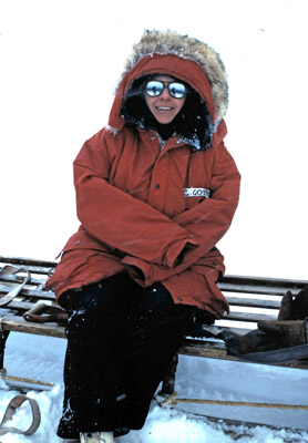 Carol sitting on Nansen sled