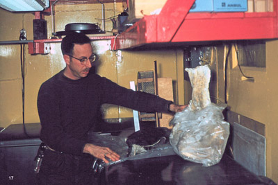 George Meyer with portion of fish retrieved from a seal at one of the ice holes used for oceanographic research at McMurdo