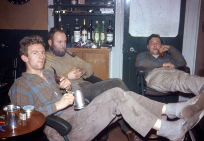 Barry Heywood, Pete Hobbs and Pete Redfern relaxing around the stove in Tonsberg House - 1963