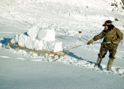 Jim Stammers hauling snowblocks for freshwater - 1958