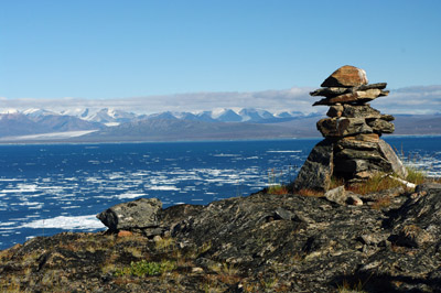 Bylot Island Overlooking Navy Board Inlet - Inuksuk with Baffin Island